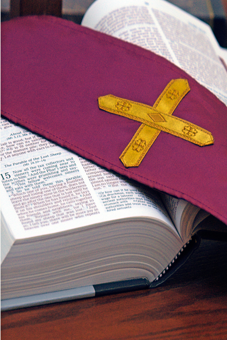 Purple stole over Bible